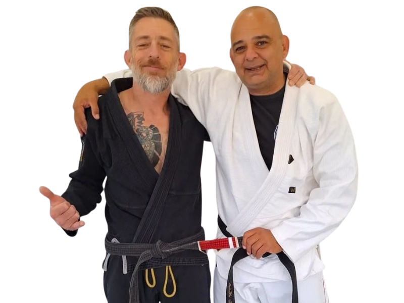 Two Elevate Martial Arts instructors standing together